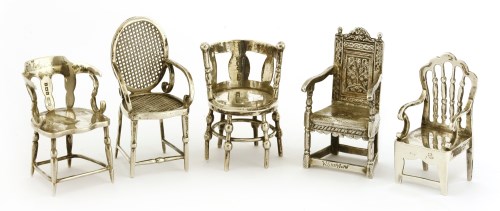 Lot 29 - Five Edwardian miniature silver chairs