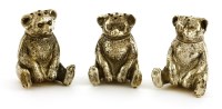 Lot 71 - Three pepper pots modelled as seated bears