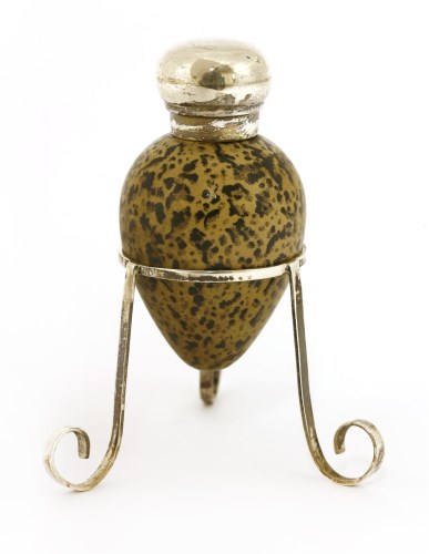 Lot 19 - A late Victorian silver-mounted and simulated egg scent bottle
