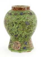 Lot 307 - A Dutch delft clobbered pottery vase