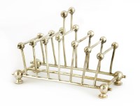 Lot 31 - A silver-plated six-division toast rack