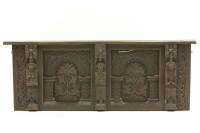 Lot 582 - A carved oak panel