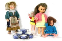 Lot 248 - A collection of mid 20th century cut out dolls
