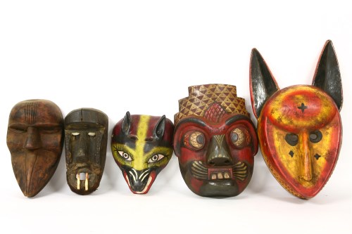 Lot 377 - Ten carved wooden African (mainly) tribal masks