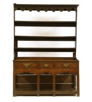Lot 576 - An early 19th century oak dresser