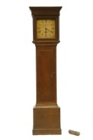 Lot 542 - An oak longcase clock