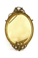 Lot 563 - A gilt framed oval girandole