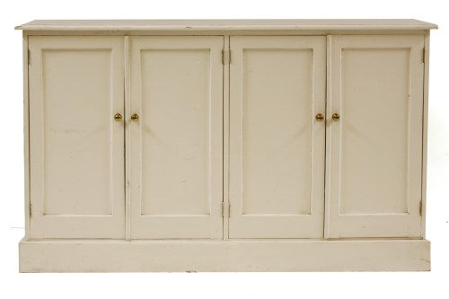 Lot 630 - A painted pine cupboard