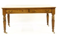 Lot 603 - A Victorian walnut library table