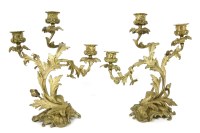 Lot 465 - A pair of gilt bronze three branch candelabra