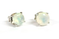 Lot 9 - A pair of white gold single stone opal stud earrings