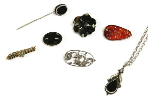 Lot 51 - A collection of items to include a silver carved Chinese Cornelian brooch