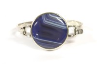 Lot 38 - A sterling silver agate bangle
