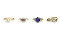 Lot 21 - A gold single stone blue synthetic ring