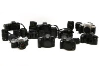 Lot 383 - A collection of eight Canon cameras and lenses to include Canon EF 28-80mm