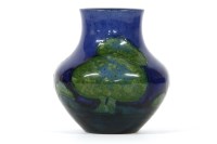 Lot 194 - A William Moorcroft Moonlit Blue vase