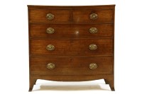 Lot 655 - A Georgian mahogany bow front chest of drawers