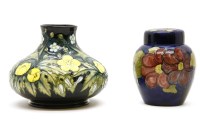 Lot 204 - A Moorcroft pottery Buttercup vase