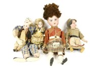 Lot 222 - Four small bisque head dolls
