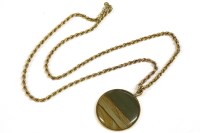 Lot 16 - A 9ct gold circular scene agate pendant