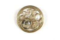 Lot 19 - A 9ct gold circular moss agate and mabe pearl brooch