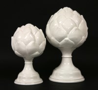 Lot 634 - A graduated pair of 'Neptune' white porcelain artichoke finials