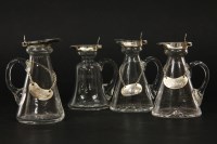 Lot 407 - Four matched silver mounted whisky tots