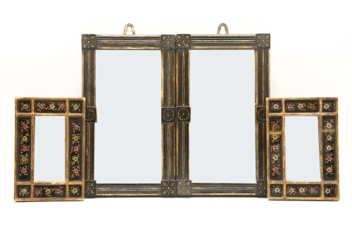 Lot 412 - A pair of small ebonised rectangular wall mirrors in the arts and crafts style