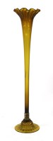 Lot 93 - A large amber glass stem vase