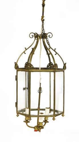 Lot 338 - A brass hexagonal and glazed hall lantern