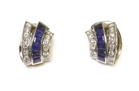 Lot 292 - A pair of cased Art Deco style diamond and sapphire vertical scroll earrings