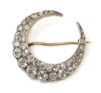 Lot 291 - A late Victorian diamond set crescent brooch