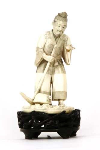 Lot 77 - A Japanese sectional carved ivory figure