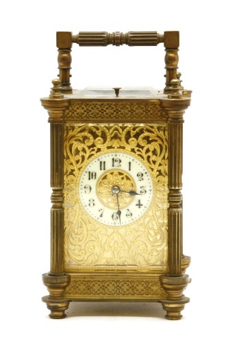 Lot 123 - A late 19th to early 20th century brass carriage clock