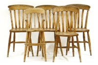 Lot 485 - A set of four 19th century beechwood and elm lath back kitchen chairs