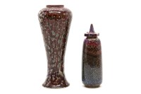 Lot 313 - A Cobridge stoneware mottled green and purple glazed vase