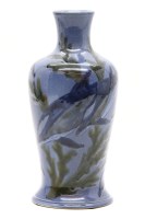 Lot 296 - A Cobridge stoneware dolphin vase