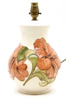 Lot 355 - A Moorcroft Hibiscus pottery table lamp base