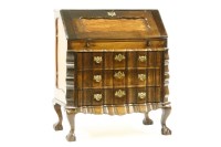 Lot 525 - A walnut bureau