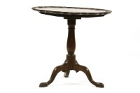 Lot 459 - A Georgian mahogany tripod table