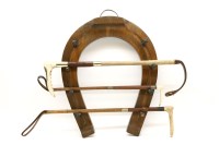 Lot 293 - A late Victorian horse shoe shaped crop rack