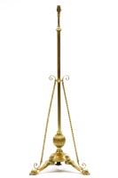 Lot 452 - A brass telescopic standard lamp