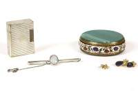 Lot 329 - A single stone oval cabochon opal bar brooch