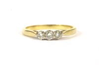 Lot 160 - An 18ct gold three stone diamond ring