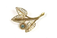 Lot 277 - A 9ct gold single stone synthetic spinel spray brooch