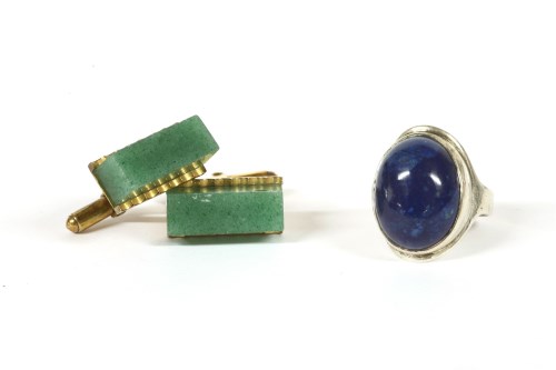 Lot 146 - A sterling silver single stone blue jasper cabochon ring