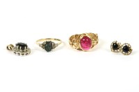 Lot 113 - A 9ct gold single stone synthetic ruby cabochon ring