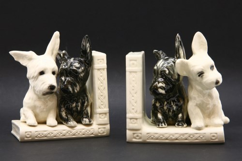 Lot 304 - A pair of Staffordshire book ends