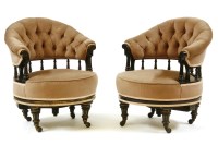 Lot 486 - A pair ebonised 19th century revolving tub chairs