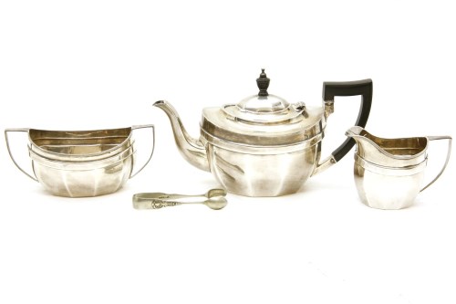 Lot 97 - A hallmarked silver three piece tea service